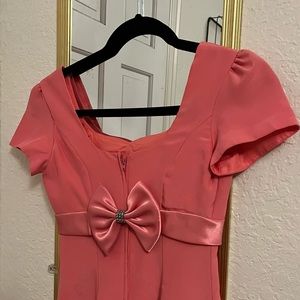 Vintage long pink dress with a beautiful bow in the back